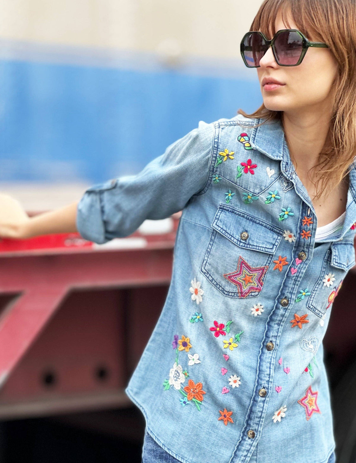 Denim shirt with whimsical hand-drawn sketchbook embroidery