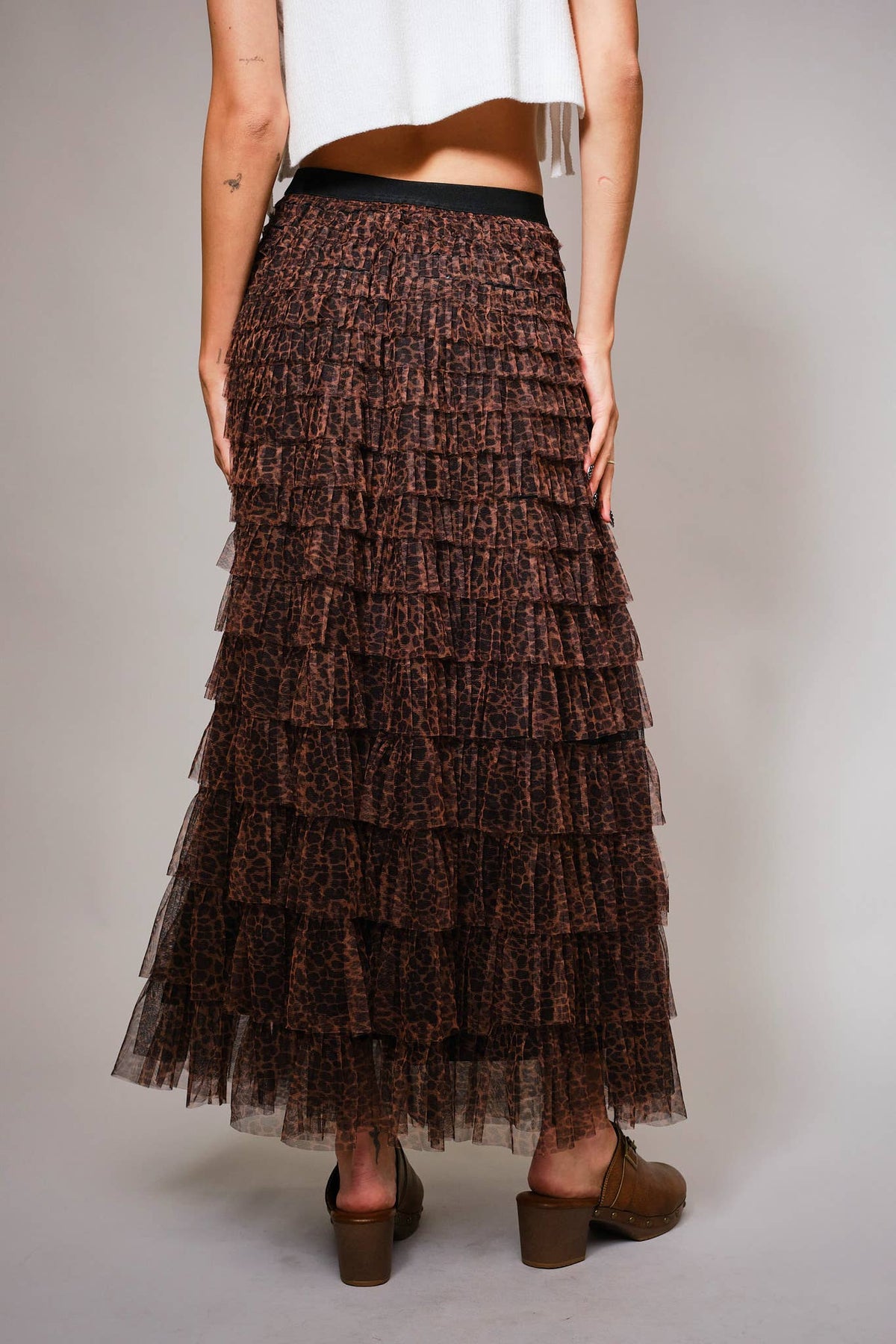 Back view of the leopard-print tiered mesh maxi skirt