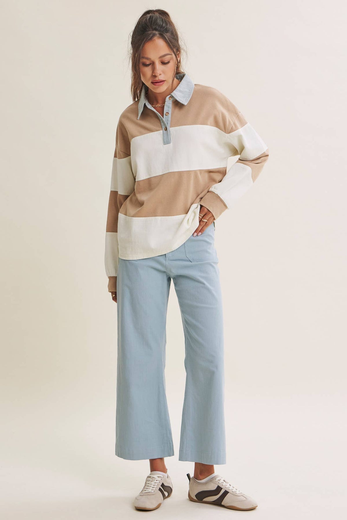 Heritage Weekend rugby top styled with light-wash jeans, showing the roomy fit and dropped shoulders.