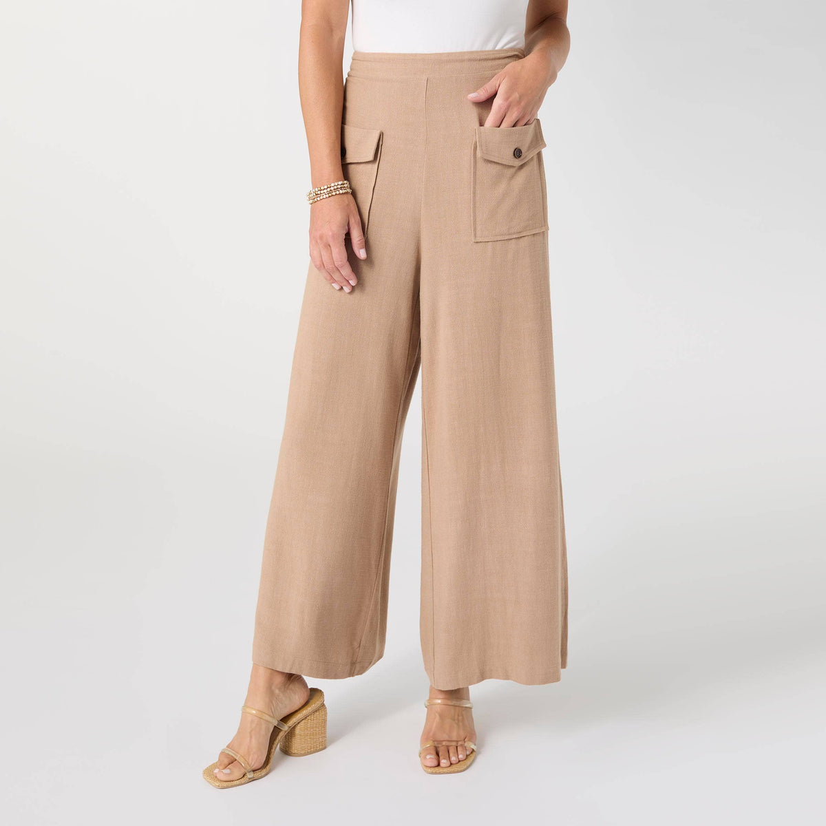 Linen-blend crop pants with button pockets and relaxed drape
