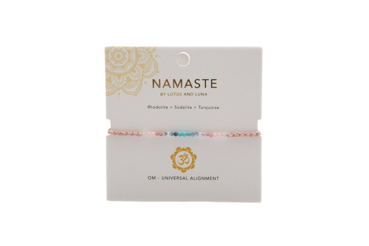 Om Namaste healing stone bracelet displayed on its Lotus and Luna intention card