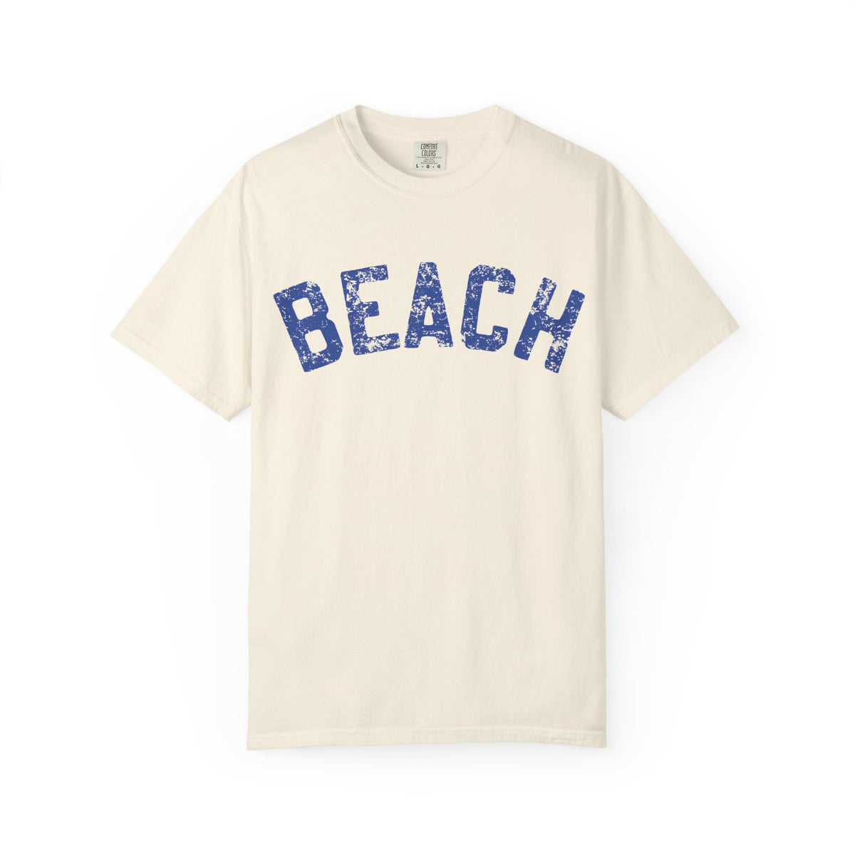 Beige t-shirt with 'BEACH' printed in blue on a white background