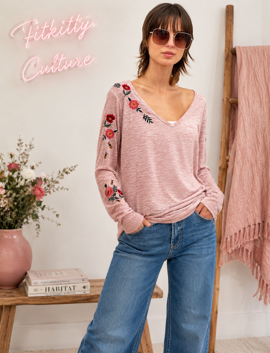 Rayon-blend long sleeve tee with floral embroidery and You Deserve Flowers detail