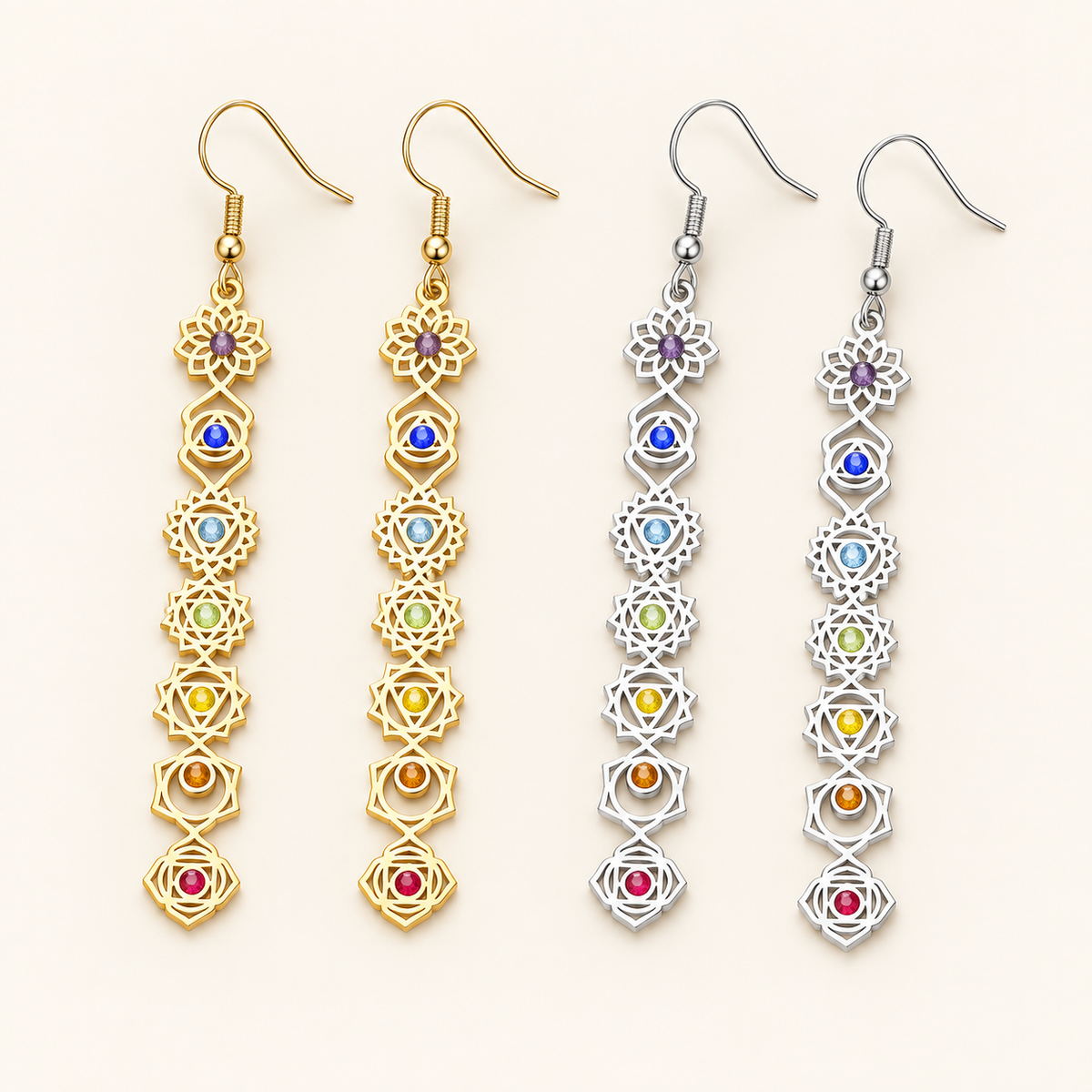 Aura Alignment Chakra Earrings in gold-tone and silver-tone finishes, each with seven colorful chakra stones, on an ivory background.
