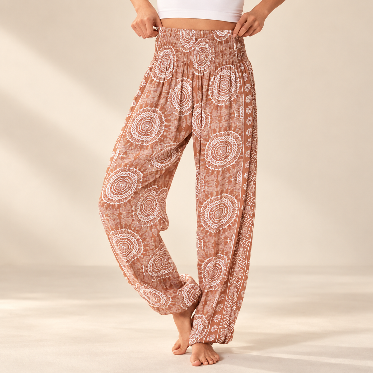 Mojave Harem Pants showing the smocked waistband and relaxed leg on an ivory background