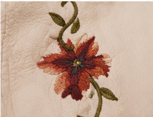 Wildflower Studded Faux Leather Moto Jacket floral embroidery close-up