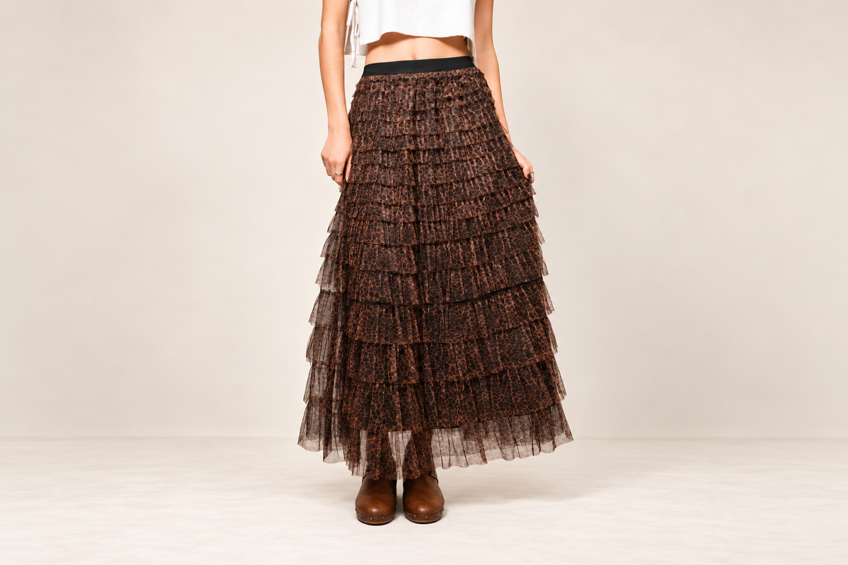 House of Caelo leopard tiered maxi skirt styled with brown boots