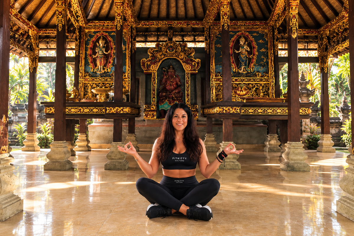 Jacquie meditating in an ornate temple