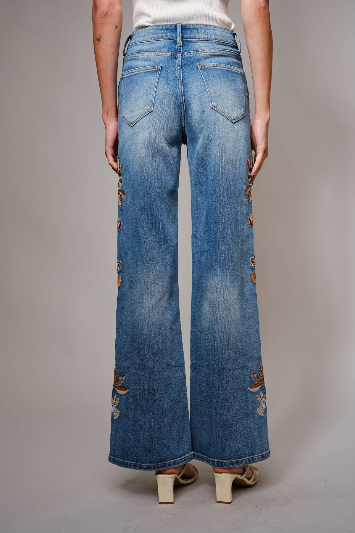 Wildflower embroidered high-rise flare jeans detail view