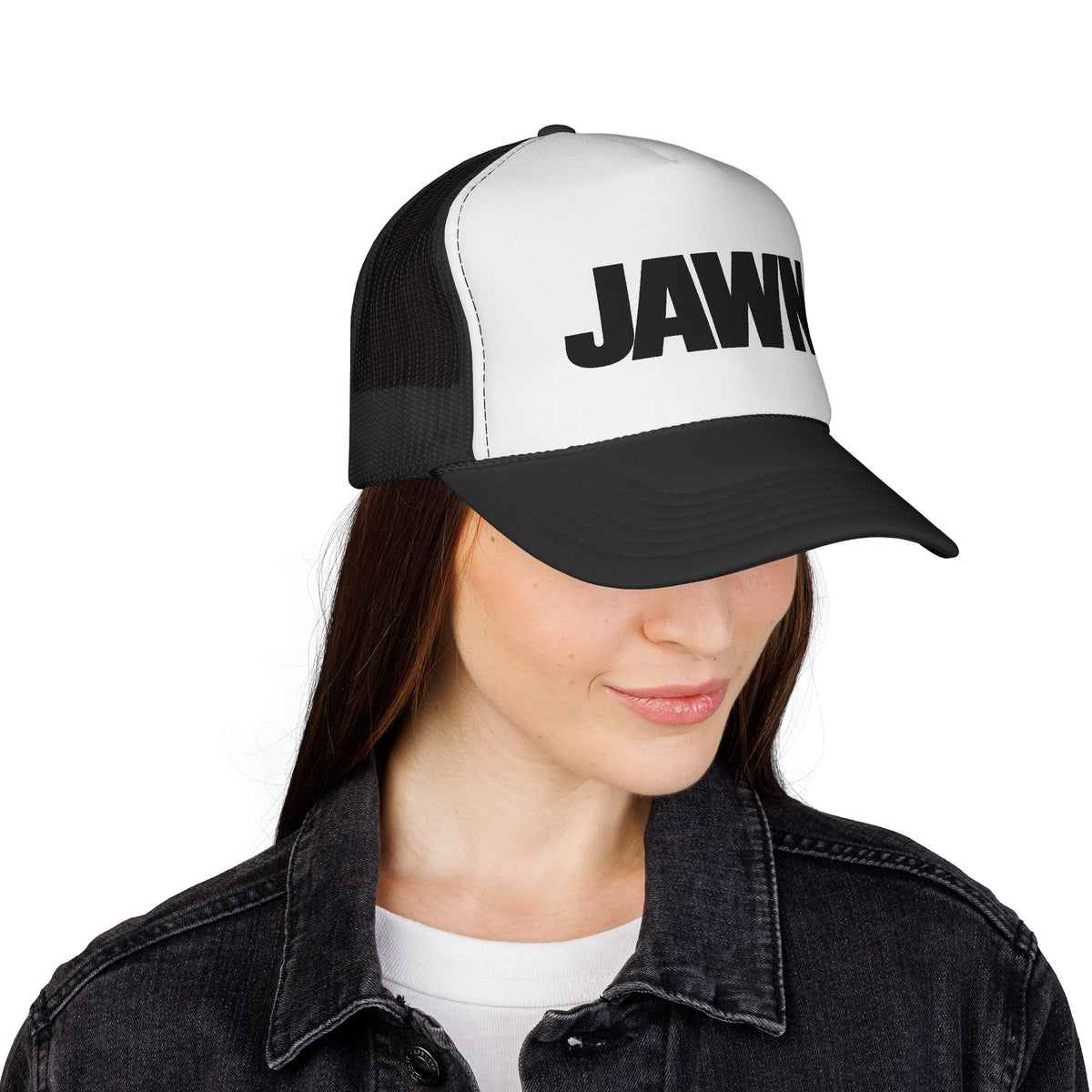 Woman wearing the black-and-white JAWN. trucker hat