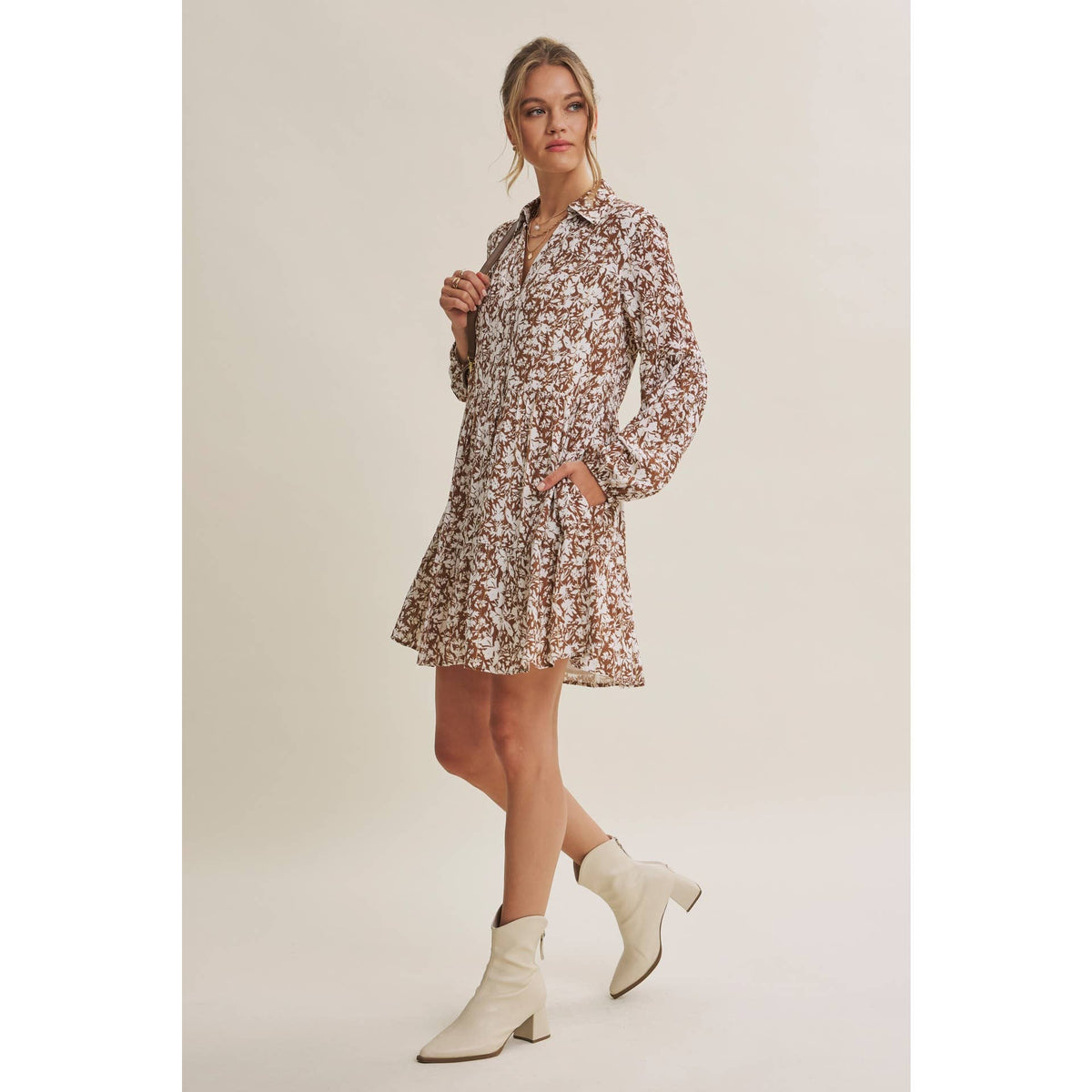 Side-angle view of the Soft Autumn floral mini dress showing the relaxed fit and sleeve shape.