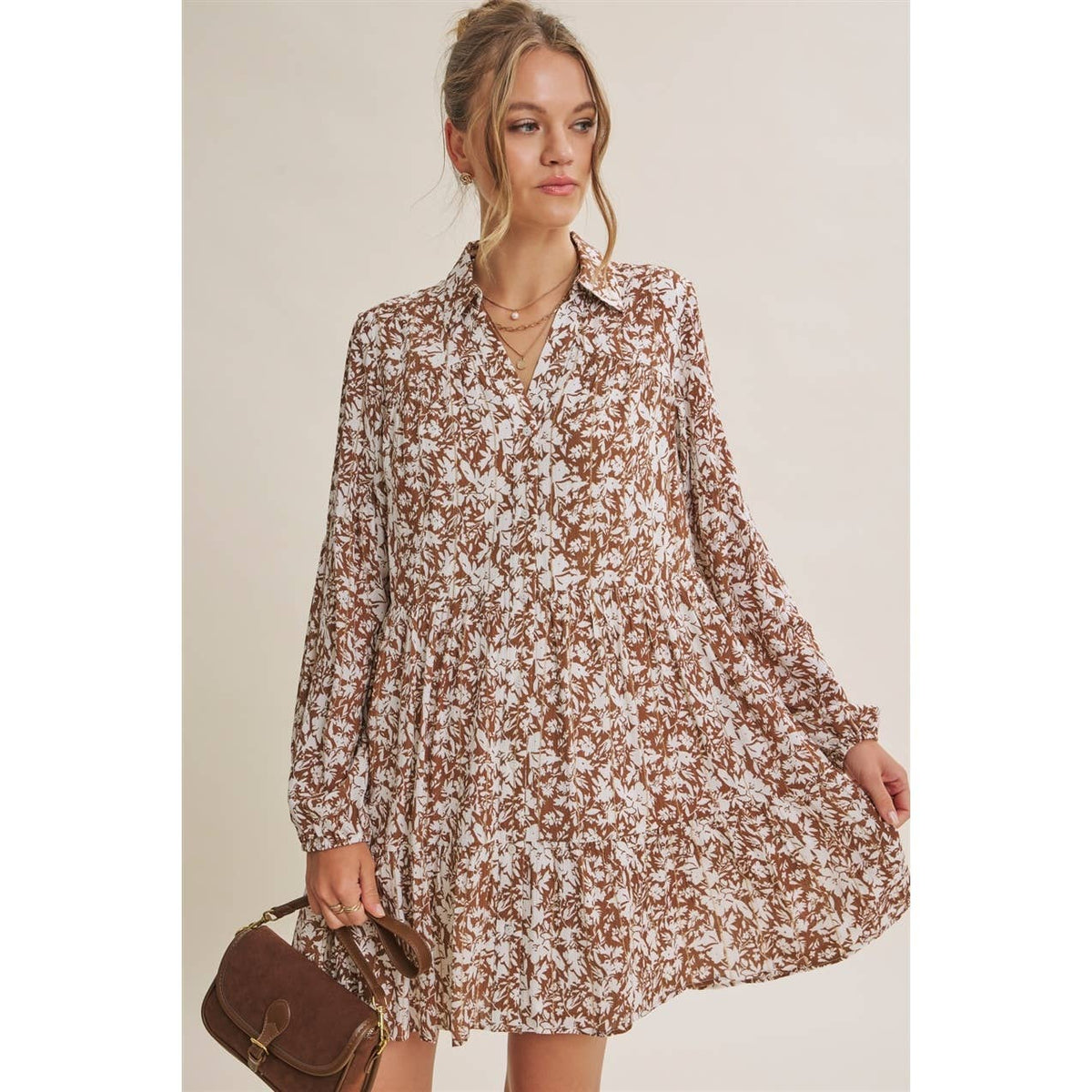 Soft Autumn mini dress with the floral skirt held out to show its relaxed width.
