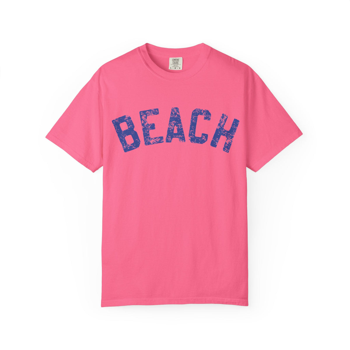 Pink t-shirt with 'BEACH' printed in blue on a white background