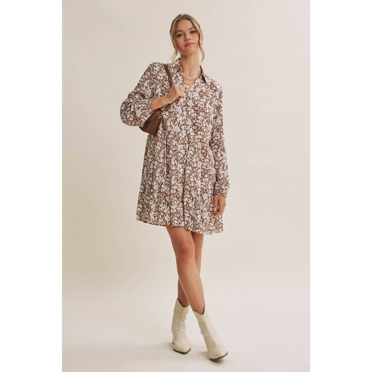 Soft Autumn floral mini dress styled with cream boots, showing the loose shift silhouette.