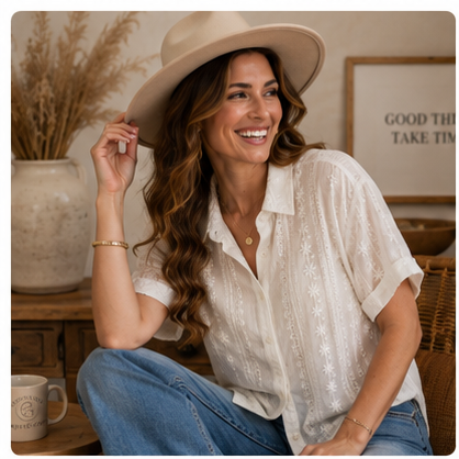 Happy woman wearing the Ivory Garden Lace Button-Down Shirt in a warm lifestyle setting