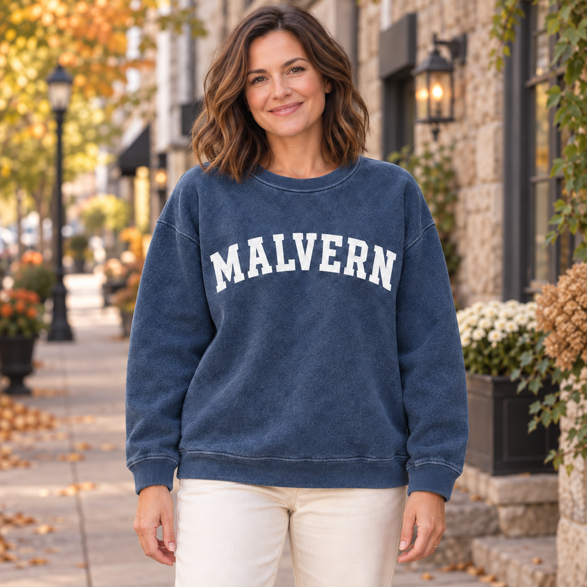 Woman wearing mineral navy MALVERN sweatshirt with full-length unfolded sleeves | House of Caelo