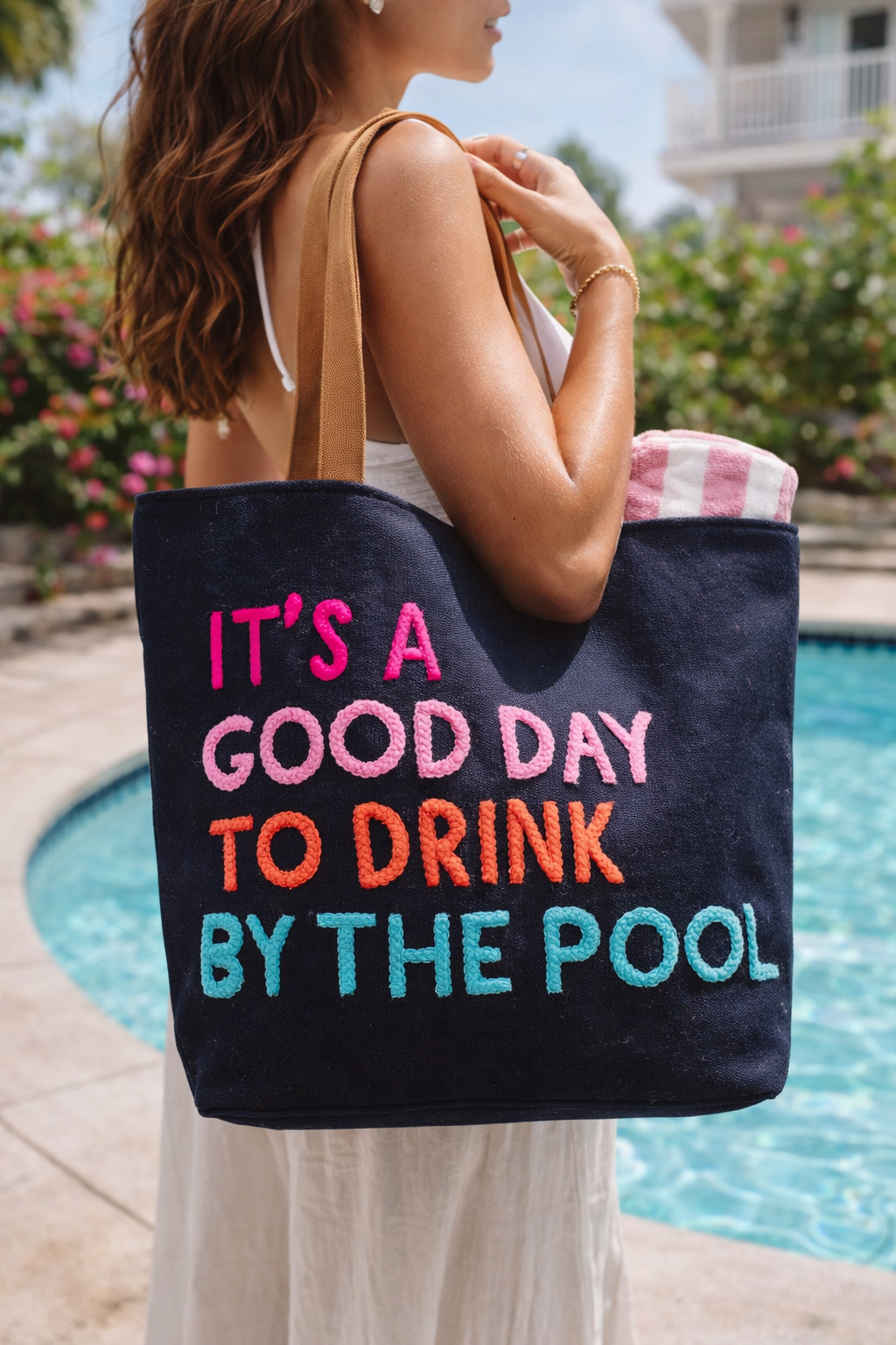 Navy woven Poolside Bliss tote with summer resort detail